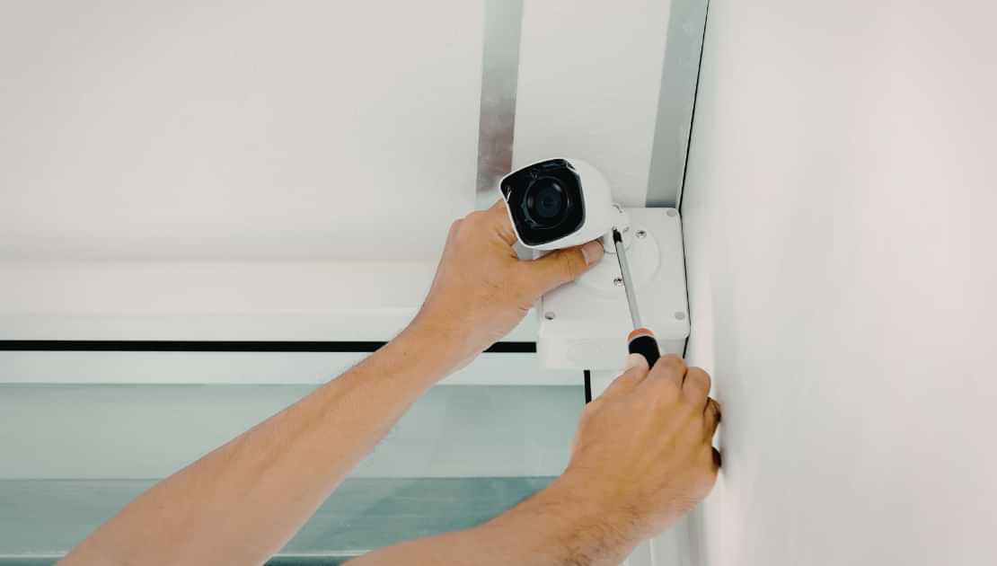 Mounting a home security camera during electrical installation