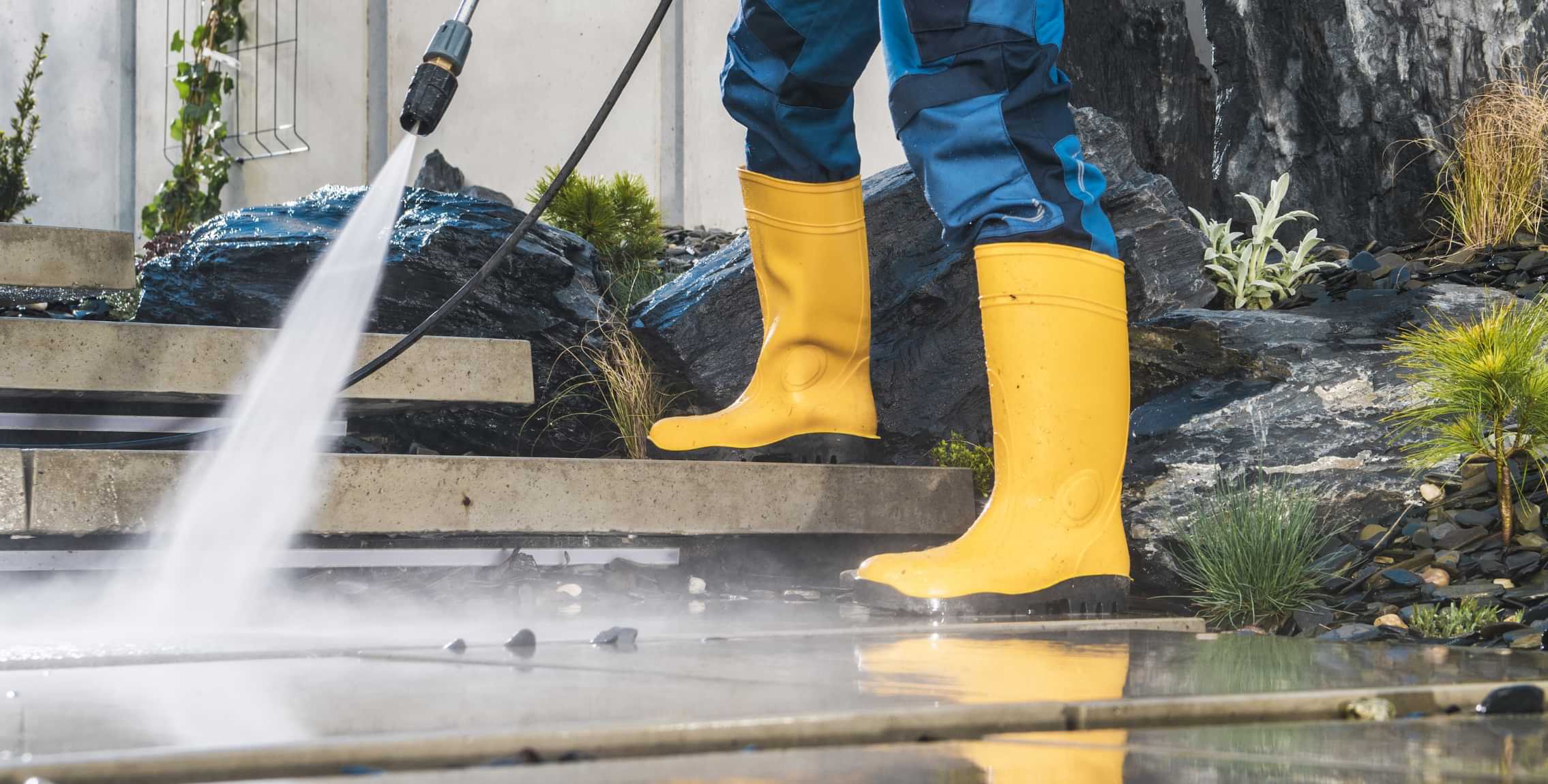 Pressure washing outdoor patio steps and garden paving
